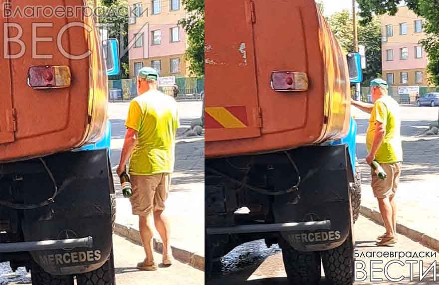 Общинска цистерна спря на автобусна спирка, докато служител си купува бира